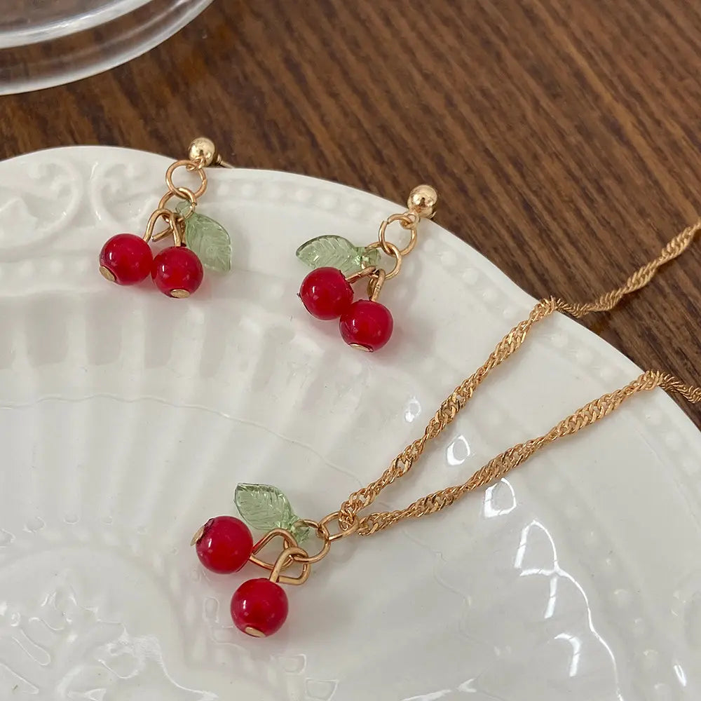 Cherry Charm Necklace & Earrings Set – Red & Gold with Leaf Detail