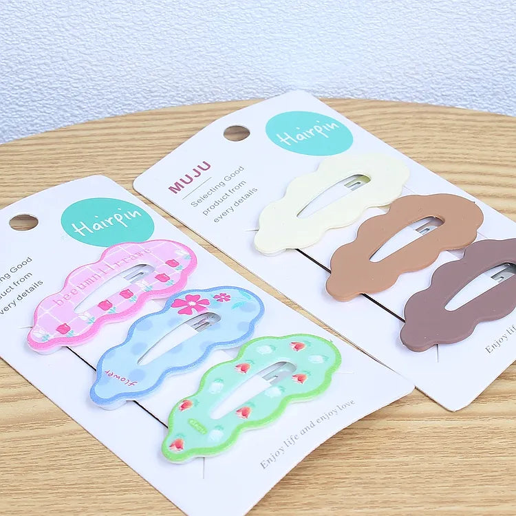 🌸 Cute Wave-Shaped Hair Clips – Set of 3