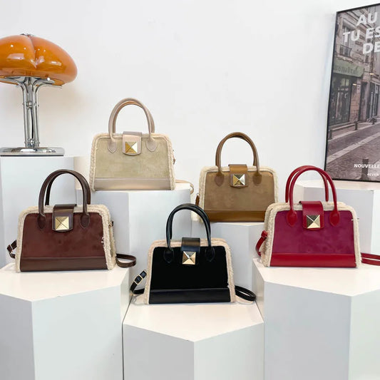 Trendy Structured Handbag – With Shearling Trim & Statement Hardware